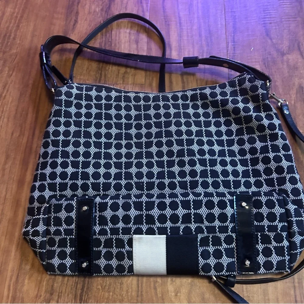 Kate Spade Penn Place Keisha crossbody bag in a black and white dot pattern